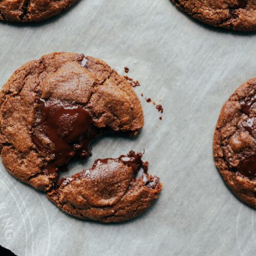 a tray of freshly baked chocolate chocolate chunk cookies