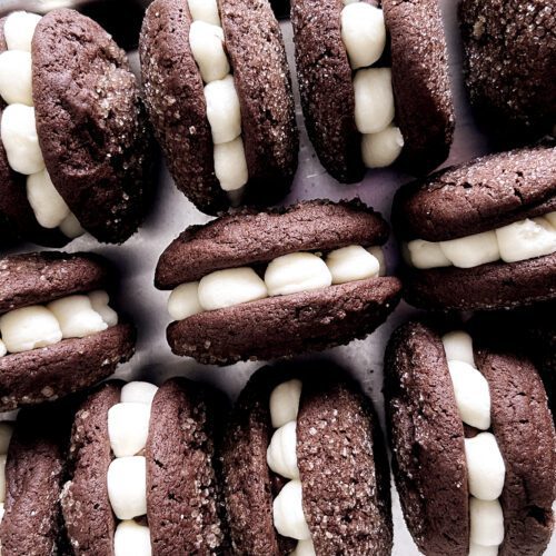 Tray of cream cheese and chocolate ganache filled Tuxedo Cookies.