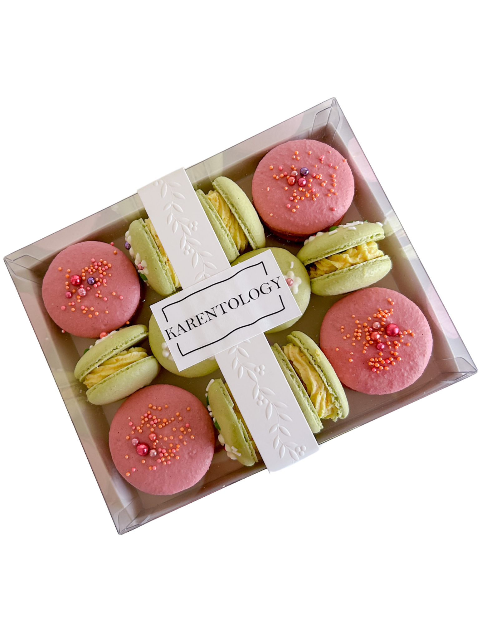 Karentology Macaron Box filled with 12 macarons of different sizes.